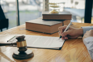 notary signing a legal document