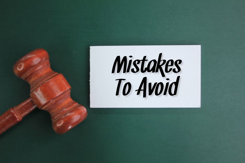 judge's gavel and white paper with the words mistakes to avoid